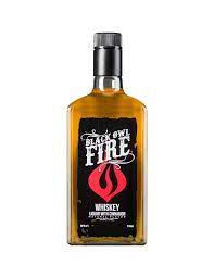 Botella de BLACK OWL FIRE 750ML de whisky - Licorería al norte de Quito con entregas a domicilio las 24 horas La Huequita Quiteña